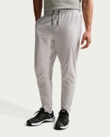 Pantaloni spotivi pentru bărbați Nike Unlimited Mens Dri-Fit Grey Fog/Black, s.S imaginea #1 — magazin online Desire.md