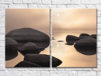 Pictură ArtPoster Black boulders in the sea (3453819)
