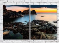 Pictură ArtPoster Rocks in the sea at sunrise (3453816)