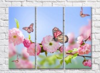 Pictură Rainbow Motley butterflies and sakura branch on a blue sky background (500514)